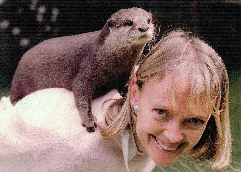 Sophie Neville with Beenie the Otter Girl with otter