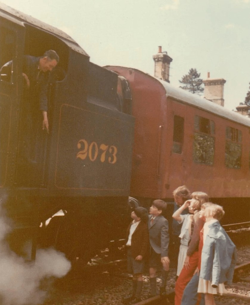 Talking to the engine driver at the Haverthwaite Railway Station on the first day of filming 'Swallows and Amazons' in 1973 (Photo: Daphne Neville)