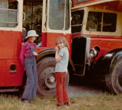 Sophie Neville outside the school bus with her sister Tamzin Neville ~ photo: Martin Neville