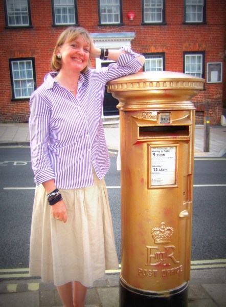 Sophie Neville with the gold pillar-box