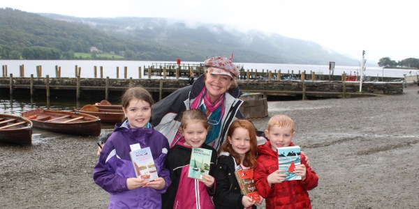 Sophie Neville with the Rushton children at the Marathon Reading of Swallows and Amazons