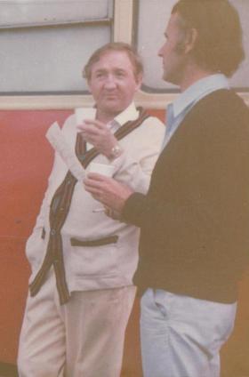 Ronnie Fraser and DoP Denis Lewiston with paper cups of champagne and the call sheet for the next day ~ photo: Daphne Neville