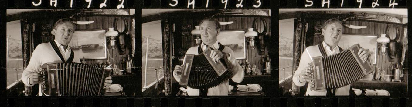 Ronald Fraser plyaing the accordion