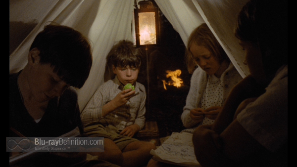 Sophie Neville in the tent at night