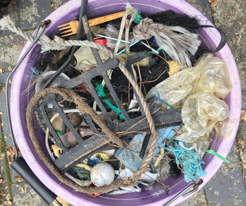 Rubbish - plastic pollution washed up on a beach Oct 2021